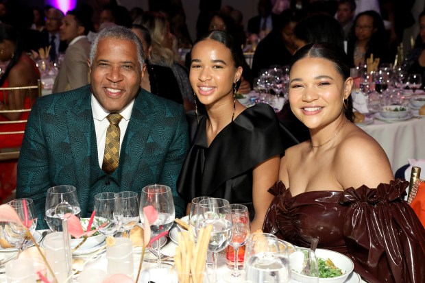 NEW YORK, NEW YORK - FEBRUARY 10: Robert F. Smith (L) attends the Fifth Annual National CARES Mentoring Movement Gala at Cipriani Wall Street on February 10, 2020 in New York City. With him are his daughters, Zoe, center, and Eliana Smith. (Photo by Monica Schipper/Getty Images for National CARES Mentoring Movement)